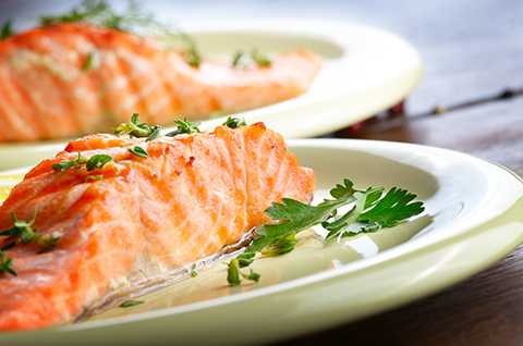 Plate of Fried Salmon fillet and spices