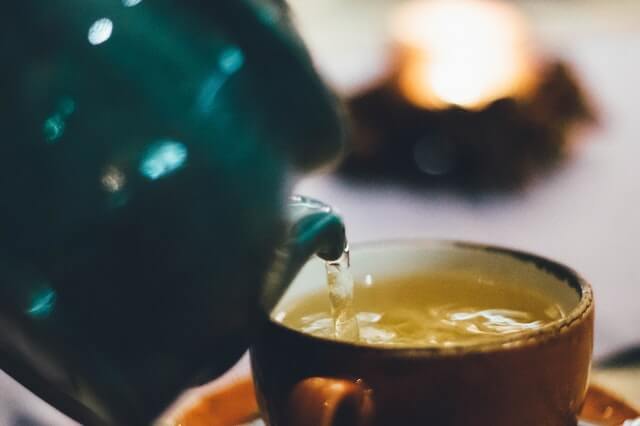 Herbal tea pouring.