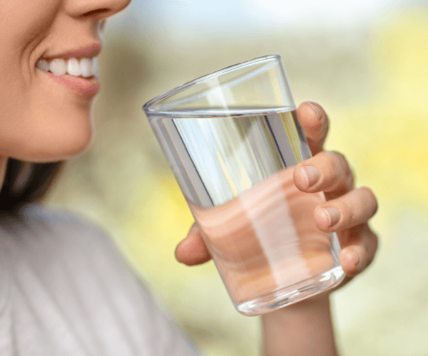 Woman drinking glass of water