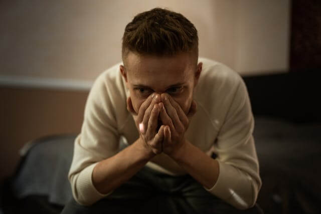 man feeling guilty